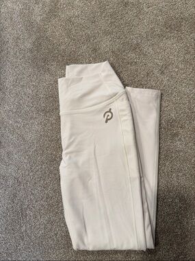 Peloton Neutral Cream High-Rise Performance Leggings with side pockets